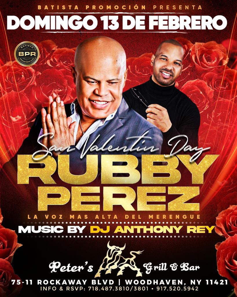 Rubby Pérez during a concert, showing his vibrant stage presence.